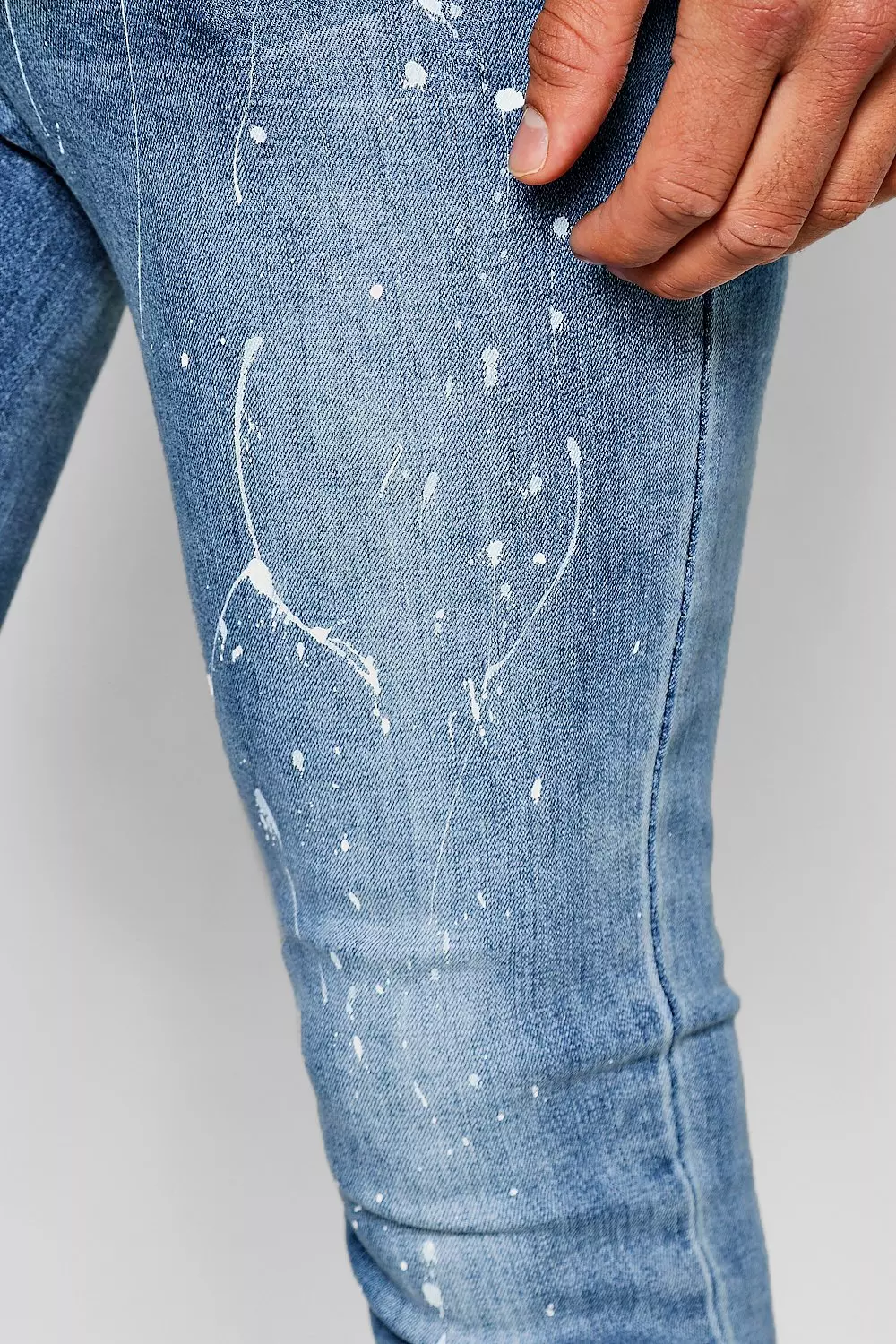 Blue jeans with paint sales splatter